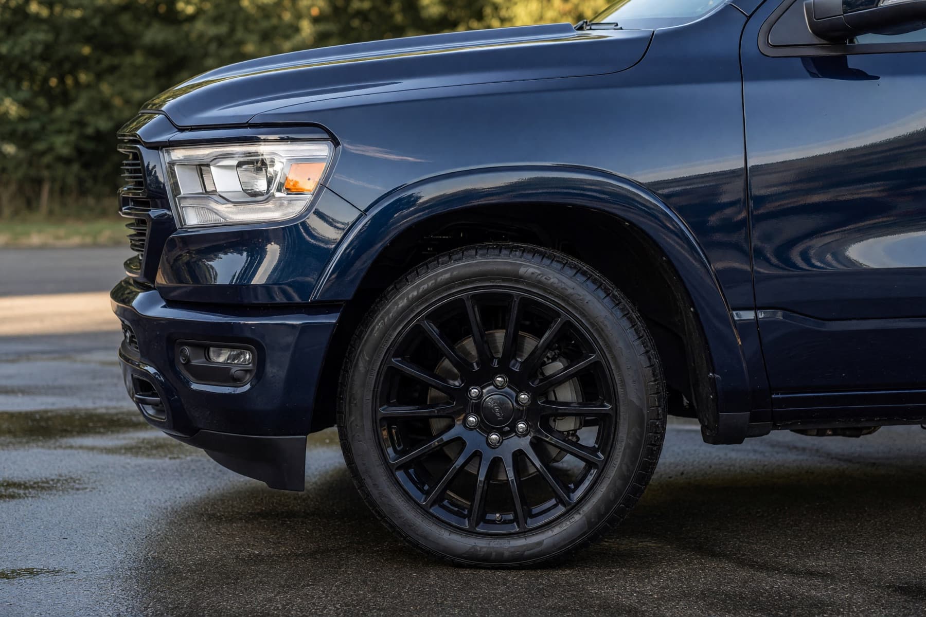 Glossy paint and clean wheel after an auto detail